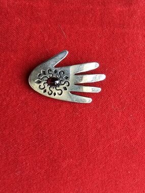 Navajo Crafted Sterling Silver Hand Motif Brooch with Red Stone Accent